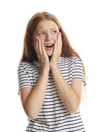 Teenage girl suffering from panic attack on white backgroundの写真素材