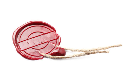 Red wax seal with twine isolated on whiteの写真素材