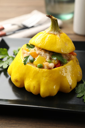 Tasty stuffed pattypan squash on wooden table, closeupの写真素材
