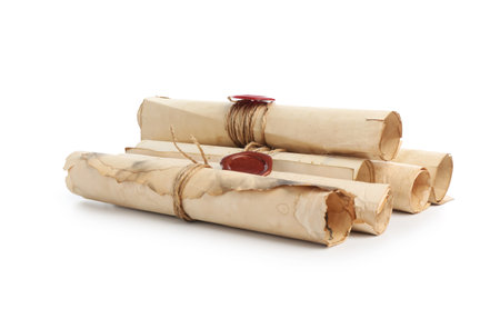Old rolled paper scrolls isolated on whiteの写真素材