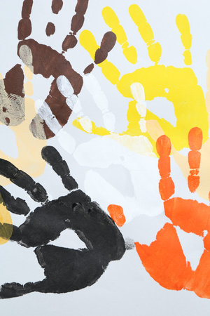 Tolerance concept. Colorful handprints on white background, flat layの写真素材