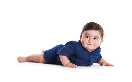 Cute little baby crawling on white background