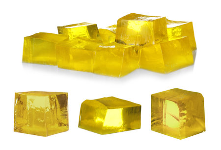 Delicious yellow jelly cubes isolated on white, collageの写真素材