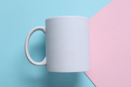 White mug on color background, top view. Mockup for designの写真素材