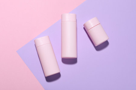 Cosmetic products on color background, flat lay. Mockup for designの写真素材