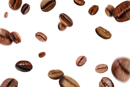 Roasted coffee beans falling against white backgroundの写真素材
