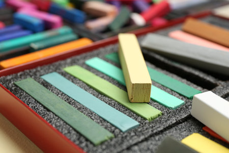 Set of colorful chalk pastels on beige background, closeupの写真素材