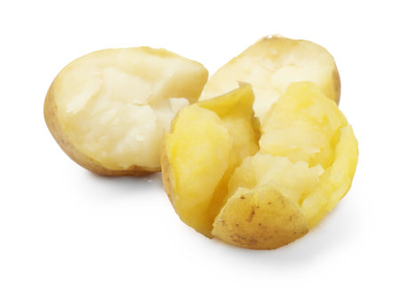 Pieces of young boiled potatoes isolated on whiteの写真素材