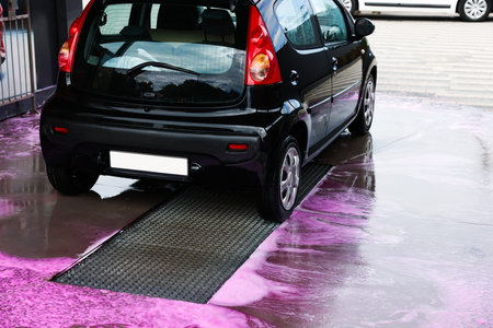 Clean auto after washing at outdoor car washの写真素材