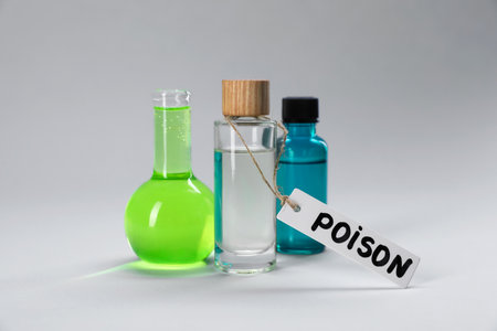 Bottles of poisons on light gray backgroundの写真素材