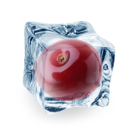 Fresh cherry in clear ice cube isolated on whiteの写真素材