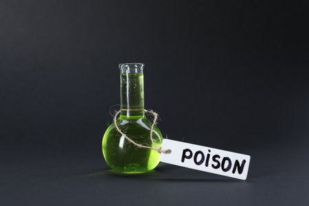 One flask with poison on black backgroundの写真素材