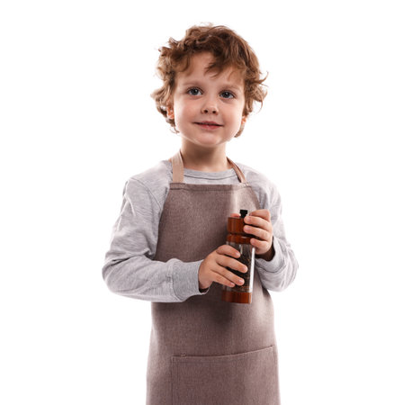 Choice of profession. Little boy with spices pretending to be a chef on white backgroundの写真素材
