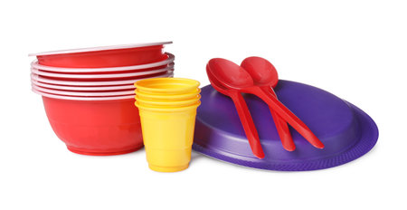 Set of disposable plastic dishware isolated on whiteの写真素材