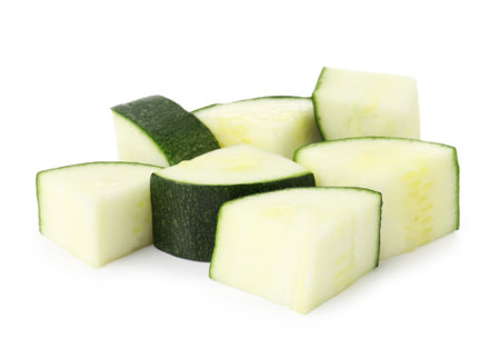 Pieces of fresh zucchini isolated on whiteの写真素材