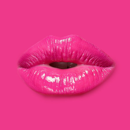 Woman's lips against background matching color of her lipstick