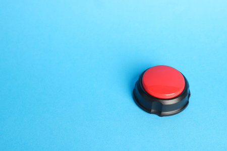 One red button on light blue background, space for text