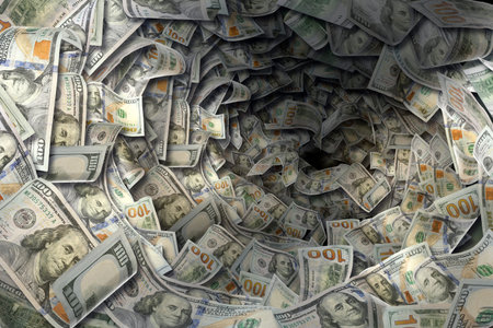 Money vortex. Dollar bills swirling in the air