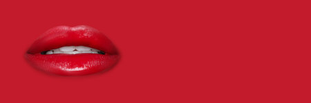 Woman's lips against background matching color of her lipstick. Banner design with space for textの写真素材