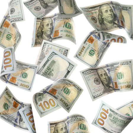 Money (dollar bills) flying against white background