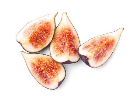 Pieces of ripe fig isolated on white, top view