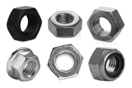 Different metal nuts isolated on white, set