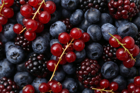 Different ripe juicy berries as background, closeup