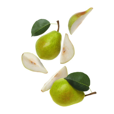 Fresh green pears flying in the air on white backgroundの写真素材