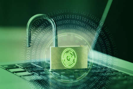 Open padlock with digital fingerprint scan on laptop, toned in green. Binary code. Cyber security