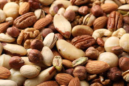 Mix of different nuts as background, closeup
