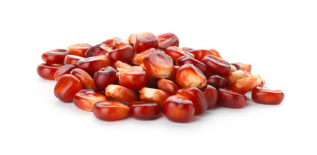 Pile of ripe red corn kernels isolated on white