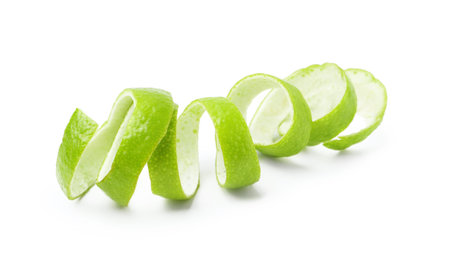One fresh lime peel isolated on whiteの写真素材