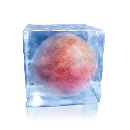 Ice cube with apple isolated on whiteの写真素材