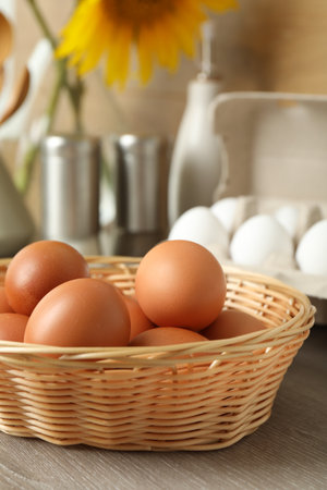 Raw chicken eggs on wooden countertop, closeupの写真素材