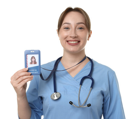 Professional nurse showing her badge on white backgroundの写真素材