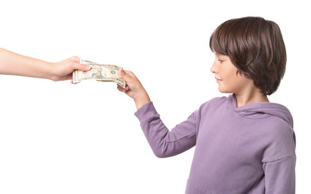 Mom giving her son pocket money on white background, closeupの写真素材