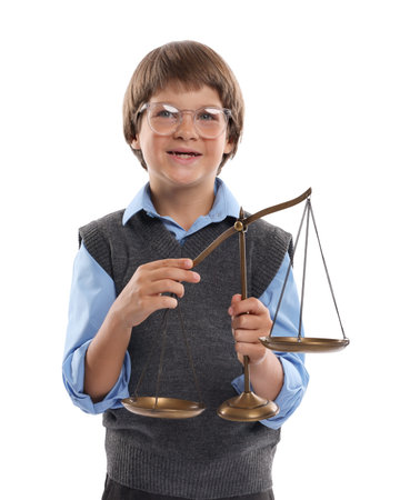 Choice of profession. Happy little boy in glasses with scales of justice pretending to be a lawyer on white backgroundの写真素材