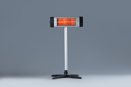 One electric infrared heater on gray backgroundの写真素材