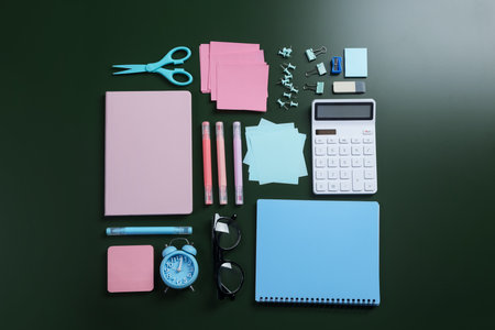 Happy teacher's day. Different stationery on green background, flat layの写真素材