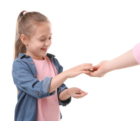 Mother giving her daughter pocket money on white background, closeupの写真素材