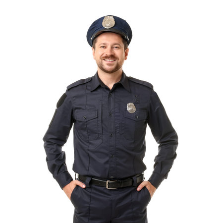 Policeman in uniform posing on white background