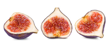 Halves of fresh figs isolated on white