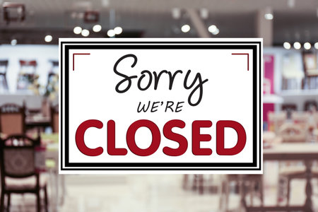 Sign Sorry We Are Closed in restaurant