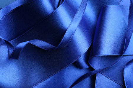 Beautiful blue ribbons as background, top viewの写真素材