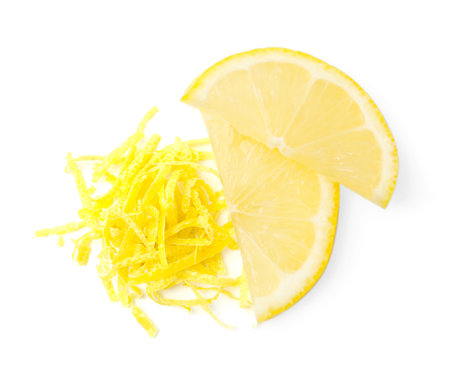 Lemon zest and pieces of fresh fruits isolated on white, top view