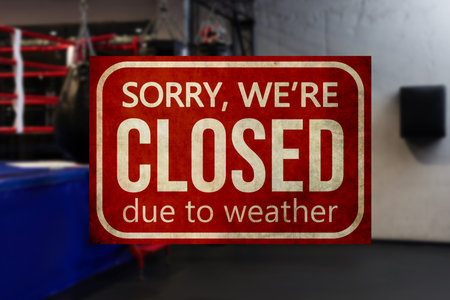Sign Sorry We Are Closed Due To Weather in gymの写真素材