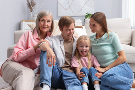 Senior woman with her son's family at home