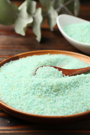 Natural sea salt on wooden table, closeupの写真素材