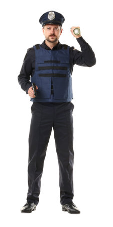 Policeman in uniform with gun and flashlight on white background