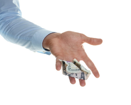 Man throwing money on white background, closeup
